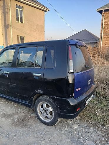 японский машына: Nissan Cube: 1998 г., 1.3 л, Автомат, Бензин, Хэтчбэк — 3