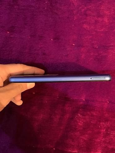 redmi 9 т: Смартфон Redmi 7А логотипом на нижней рамке и крышке), синий цвет — 4