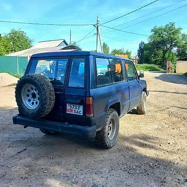тико 2: Isuzu Trooper: 1984 г. — 2