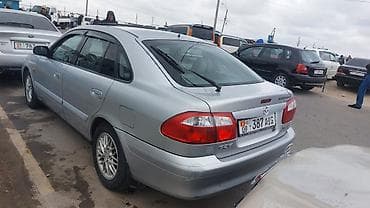 машинага газ: Mazda 626: 2001 г., 2 л, Кол менен иштөөчү, Бензин, Лифтбек — 3