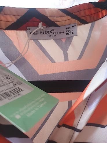 Продаю Новый шикарный стильный шелковый костюм.Размер на 46,48 и 50 — 3