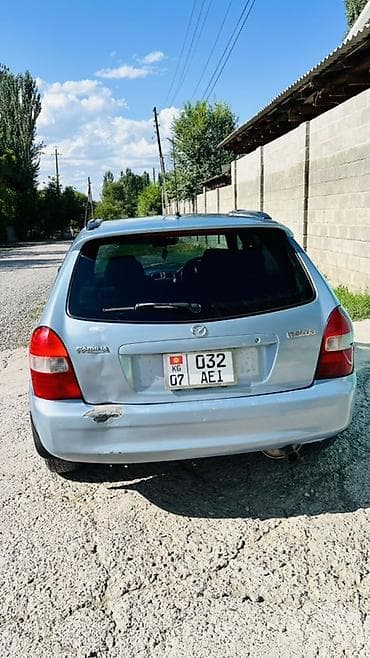 Транспорт: Mazda Familia: 2001 г., 1.5 л, Автомат, Бензин, Универсал — 7