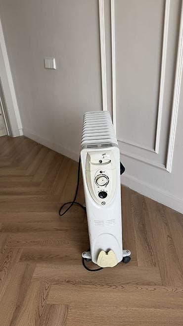 Техника для уборки: Масляный обогреватель Ballu, Кол-во секций: 10 и более — 3