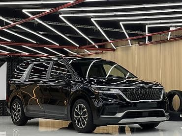 vw sharan: Kia Carnival (KA4) — просторный 7-местный минивэн в черном цвете с — 1