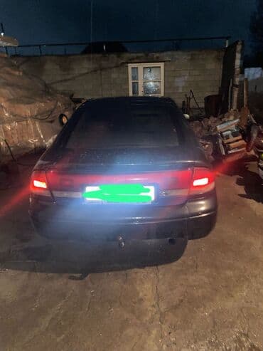 моющий пылесос для химчистки салона автомобиля бу: Mazda 626: 1992 г., 2 л, Механика, Бензиновая, Седан — 4