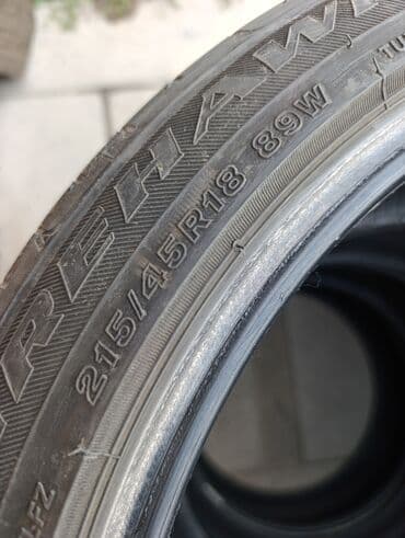 новые шыны: R-18 -215-45. Привозные из Японии. Шины летние комплект 4 шт. По нашим — 8