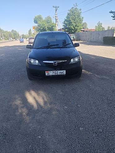 Mazda Demio: 2004 г., 1.3 л, Автомат, Бензин, Хэтчбэк