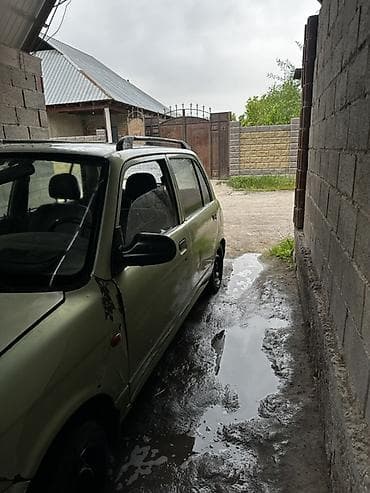 мицубиси спайс стар: Daihatsu Cuore: 2001 г., 1 л, Механика, Бензин, Хэтчбэк — 3