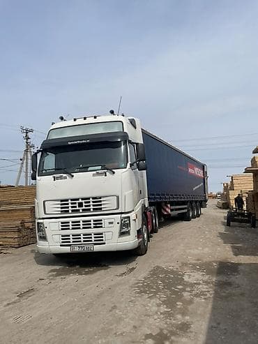 ауман тягач: Грузовик, Volvo — 3