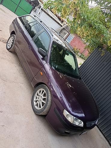 Mazda 323: 2000 г., Универсал