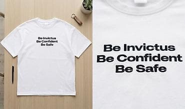 Футболка белого цвета с надписью на груди: “Be Invictus • Be Confident — 1