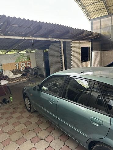 радар авто: Mazda 323: 2001 г., 1.6 л, Автомат, Бензин, Универсал — 5