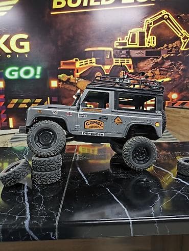 автомобильная рация: Радиоуправляемый внедорожник Land Rover Defender 90 (масштаб 1:12) - — 3