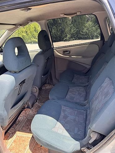 Nissan Almera Tino: 2000 г., 1.8 л, Механика, Газ — 4