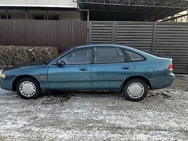 привазной матор 1: Mazda : 1993 г., 2 л, Механика, Бензин, Хэтчбэк — 4