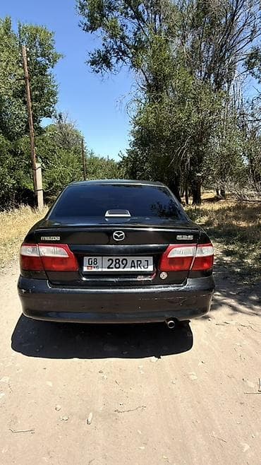 Транспорт: Mazda 626: 2001 г., 2 л, Механика, Бензин, Седан — 5