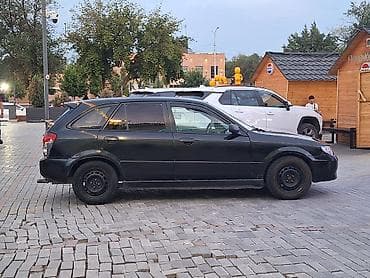 mazda 626 1998: Mazda 323: 2002 г., 1.3 л, Механика, Бензин, Универсал — 3
