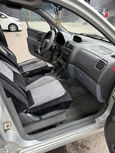 eclipse cross: Mitsubishi Space Star: 2001 г., 1.3 л, Механика, Бензин, Хэтчбэк — 7