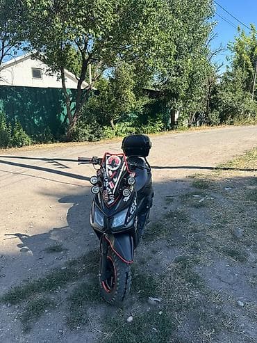 тюнин: Скутер/мопед 50–150 см³ (визуально — спортивный городской) — 1