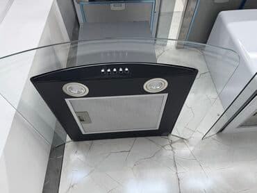 Вытяжка **Midea MH60C471X** — это стильная и функциональная кухонная