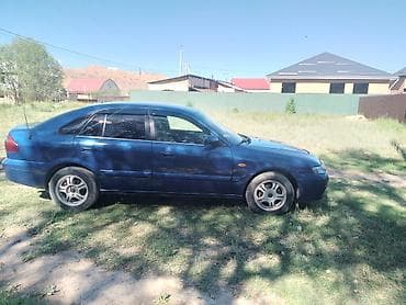 желмаян матор: Mazda 626: 2000 г., 1.8 л, Кол менен иштөөчү, Бензин, Лифтбек — 4