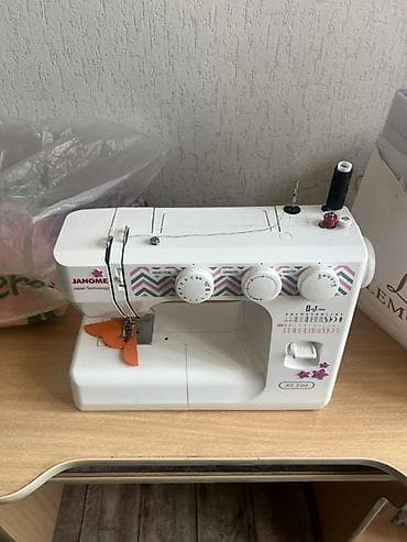 Техника жана электроника: Тигүүчү машина Janome, Электромеханикалык, Автомат — 1