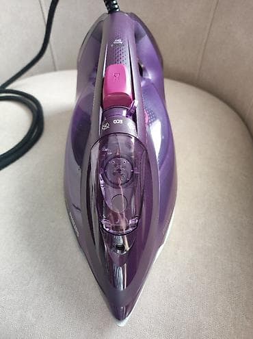 Уход за одеждой: Утюг Philips DST7061 Характеристики: Постоянная подача пара: 55 г/мин — 9