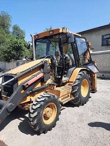 Экскаватор, Caterpillar, Колесный — 4