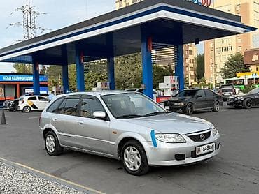 launch 431: Mazda 323: 2003 г., 1.6 л, Механика, Бензин, Универсал — 2