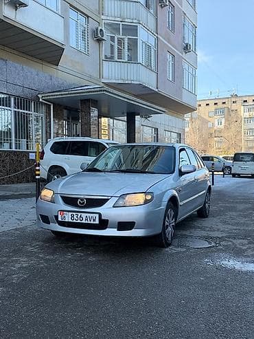 приора автомат: Mazda 323: 2003 г., 1.6 л, Автомат, Бензин, Хэтчбэк — 3