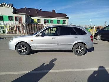 Унаа: Mazda 323: 2001 г., 1.6 л, Кол менен иштөөчү, Бензин, Хетчбек — 3