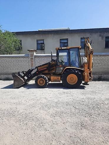 Экскаватор, Caterpillar, Колесный — 5