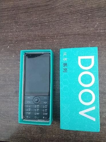 psp e1000: Кнопочный телефон DOOV в комплектной коробке. Нужна замена — 1