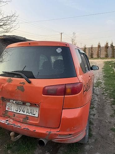 Унаа: Mazda Demio: 2003 г., 1.5 л, Кол менен иштөөчү, Бензин, Хетчбек — 4