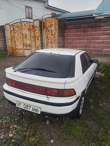 Mazda 323: 1990 г., 1.6 л, Седан