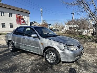 ravon 3: Mazda 323: 2003 г., 1.6 л, Механика, Бензин, Седан — 5