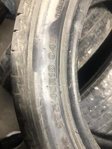 80 b4: Шины 235 / 45 / R 18, Лето, Легковые, Bridgestone — 1