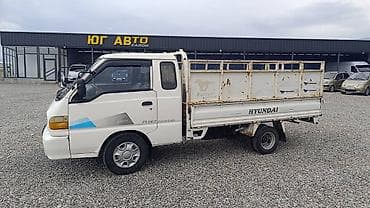 Hyundai Porter (двухдверный бортовой малотоннажник) Портер 1 2001г — 1