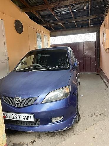 Mazda Demio: 2003 г., 1.5 л, Автомат, Бензин, Хэтчбэк