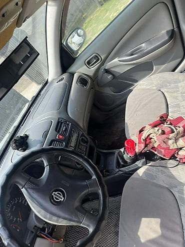 нисан елгрант: Nissan Almera: 2000 г., 1.5 л, Ручные, Бензин, Хэтчбэк — 4