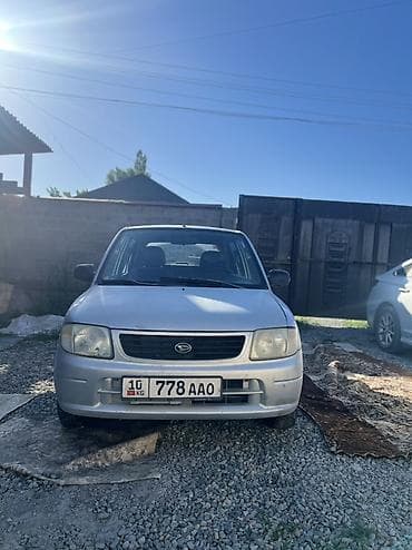 зеркало большие: Daihatsu Cuore: 2002 г., 1 л, Механика, Бензин, Хэтчбэк — 7