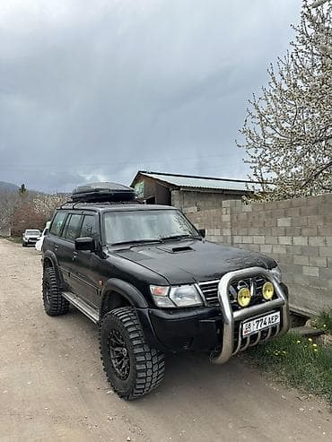 глушитель выхлопных: Nissan Patrol: 2000 г., 3.2 л, Механика, Дизель, Внедорожник — 7