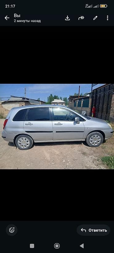 салон на авто: Suzuki Liana: 2003 г., Универсал — 2