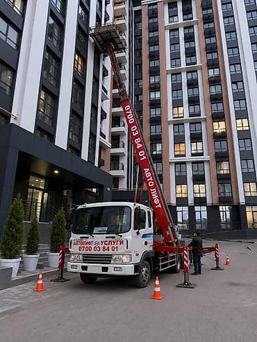 Услуги автолифта в для высотных работ - Автолифт на шасси грузовика с