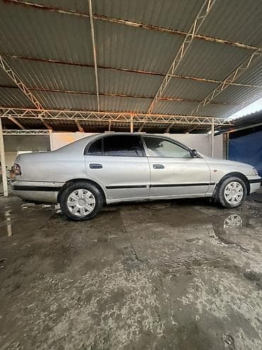 тико 2: Toyota Carina E: 1997 г., 1.8 л, Кол менен иштөөчү, Бензин, Седан — 3