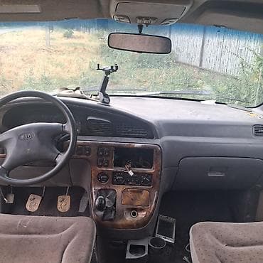 Унаа: Kia Carnival: 1998 г., 2.9 л, Кол менен иштөөчү, Дизель, Вэн/Минивэн — 1