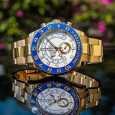 Кол сааттар: Rolex Yacht-master. • Корпус покрыт 18К желтым золотом. • Часы — 3