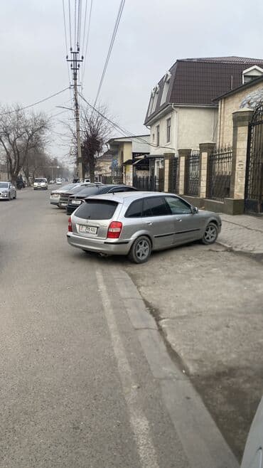 мазда милениа: Mazda 323: 1998 г. — 1