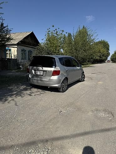 mini cuper: Honda Fit: 2005 г., 1.3 л, Автомат, Бензин, Хэтчбэк — 4