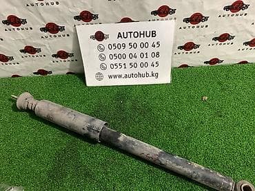 platz: Амортизатор задний для Toyota Platz (SCP11), двигатель 1SZ‑FE, год — 1